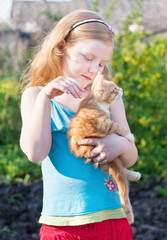 smile girl with cat outdoor