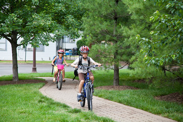 Kids Biking to School © dasharosato