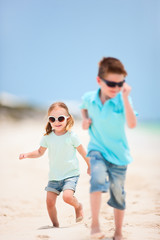 Kids running at beach