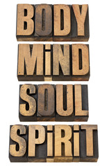 body, mind, soull and spirit in wood type
