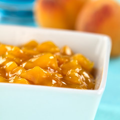 Bowl full of fresh peach compote (Selective Focus)