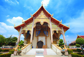 Thai temple with blue sky (Wachiratumsatit temple, Bangkok)