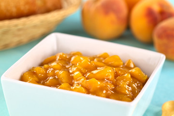 Bowl full of fresh peach compote (Selective Focus)