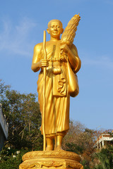 Obraz premium Golden standing Buddha statue