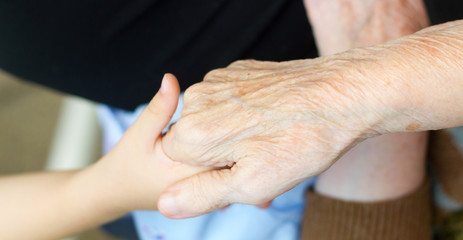 Old and young hand