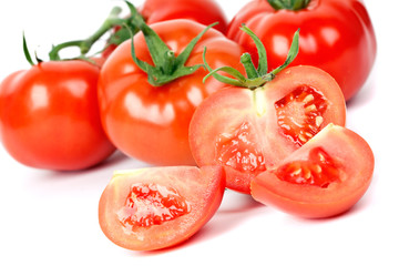 Fresh tomatoes isolated on white