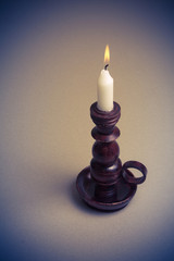 Candle in vintage candlestick