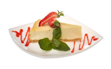 a piece of strawberry cheesecake on whit
