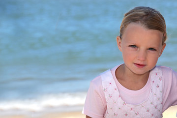 Young girl by the sea