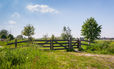 Wooden fence in a colorful rural landscape