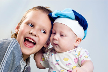 Two little brothers are expressed by a delight and gladness