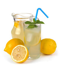 lemon juice in a jug and fruit