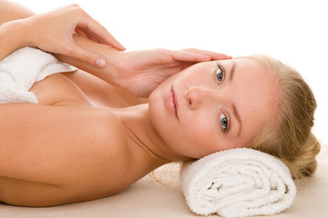 Obraz na płótnie Canvas Woman on massage bed