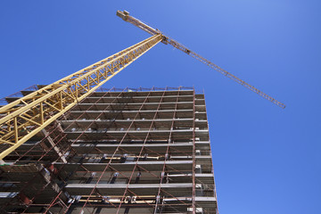 construction site with tower crane - cantiere, gru, cielo blu