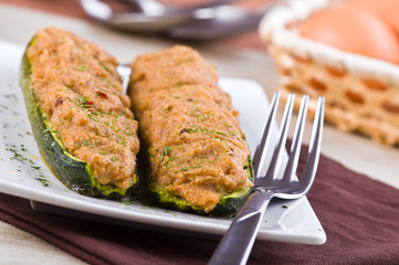 Stuffed zucchini halves.