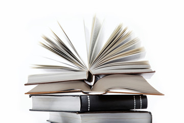 A stack of books on a white background.