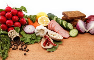 Healthy food. Fresh vegetables and fruits on a wooden table.