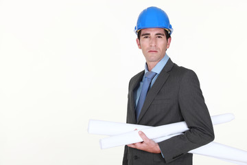 portrait of architect holding blueprints isolated on white
