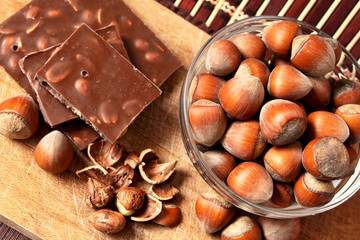 bowl of hazelnuts and chocolate