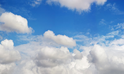Background of azure sky with clouds on beautiful summer day