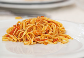 Spaghetti con sugo di pesce