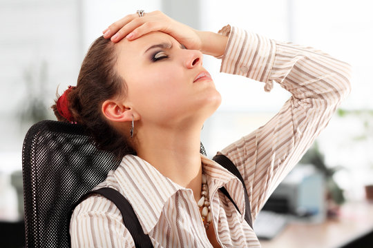 business woman tired depressed in office