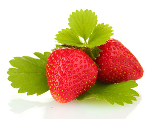 sweet ripe strawberries with leaves isolated on white