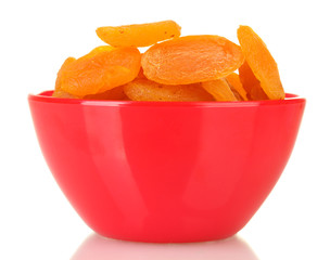 delicious dried apricots in bright bowl isolated on white