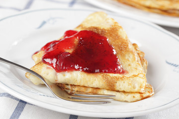 Crepes with cranberry jam