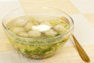 Chicken soup with vegetables and quenelles