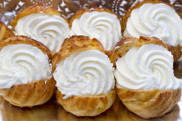 closeup of some profiteroles, lionesas