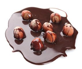 delicious hazelnut and chocolate syrup isolated on white