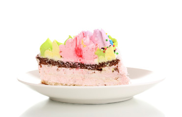 Creamy cake on saucer isolated on white