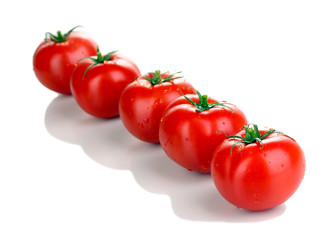 Fresh tomatoes isolated on white