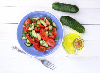 Fresh salad with tomatoes and cucumbers