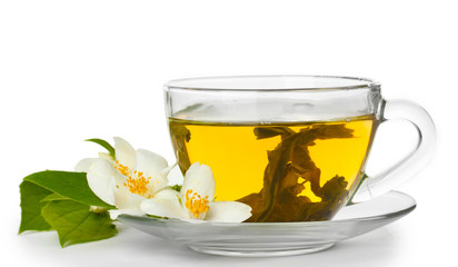 cup of green tea with jasmine flowers isolated on white