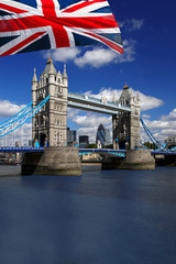 London Tower Bridge with colorful flag of England