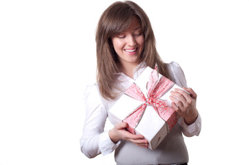 Young smiling woman holding gift