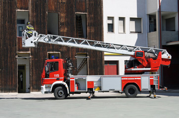 fire trucks ladder truck during a rescue mission