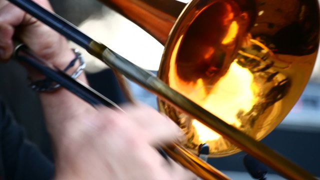 A man playing on trombone