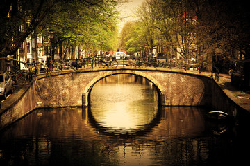 Amsterdam. Romantic bridge over canal. - obrazy, fototapety, plakaty
