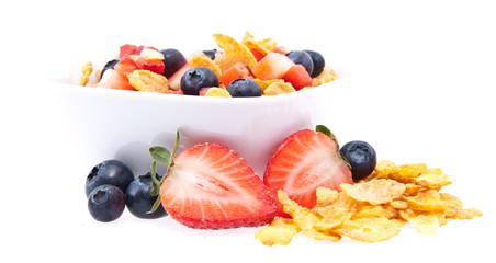 Cornflakes with fresh fruits on white © HandmadePictures