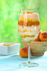 Fresh homemade rice pudding with peach compote