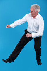 Elderly man dancing