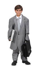 Boy dressed as a businessman