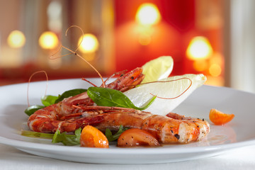 fried scampi with mixed salad and cherry tomatoes