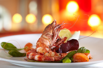 fried scampi with mixed salad and cherry tomatoes