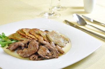 Lamb medallions with homemade potato pancakes, Czech cuisine