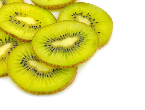 sliced kwi fruit piled on white
