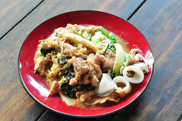 Sukiyaki with pork and squid, Asian cuisine